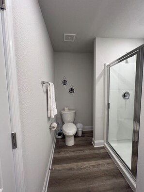 Shower, hair dryer, towels, soap