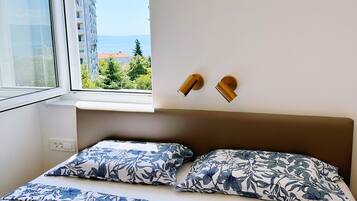 2 chambres, fer et planche Ă repasser, Wi-Fi gratuit, draps fournis