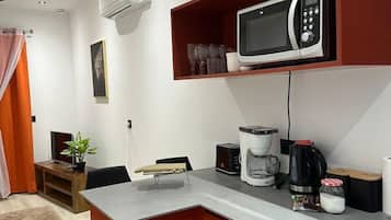 Microwave, espresso maker, cookware/dishes/utensils