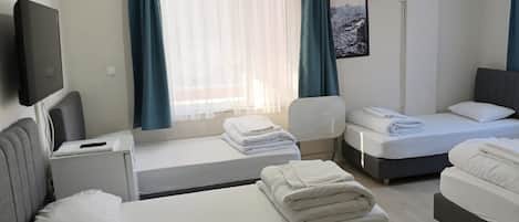 Family Quadruple Room | Desk, free WiFi