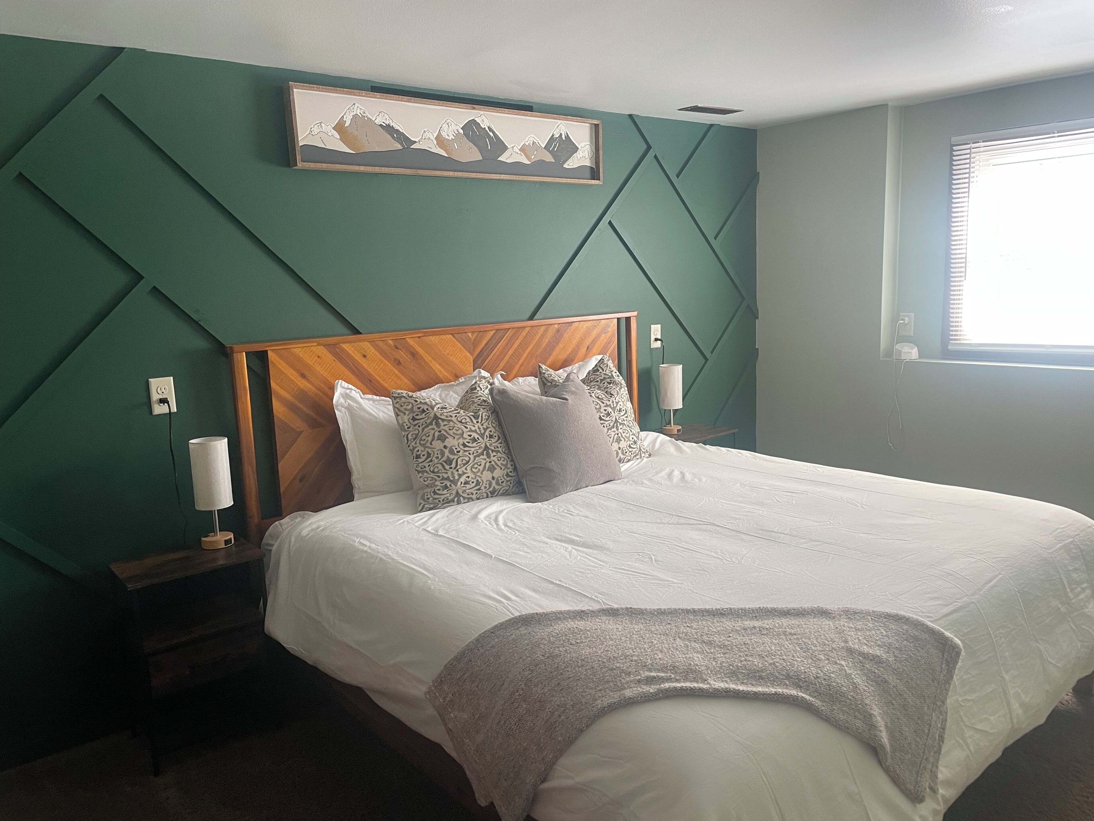 1 bedroom, desk, iron/ironing board, travel crib