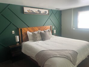 1 bedroom, desk, iron/ironing board, travel crib