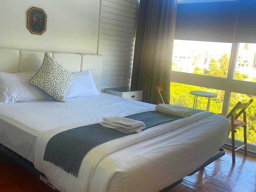 Quarto quádruplo família, vista para a montanha
