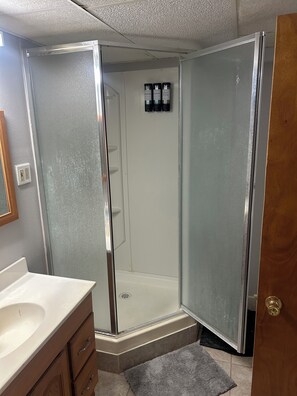 Shower, towels, soap, shampoo