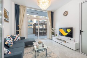 Deluxe Apart Daire | Oturma alanı | Düz ekran televizyon 