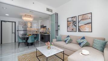 Elite Apartment | Living area | Flat-screen TV