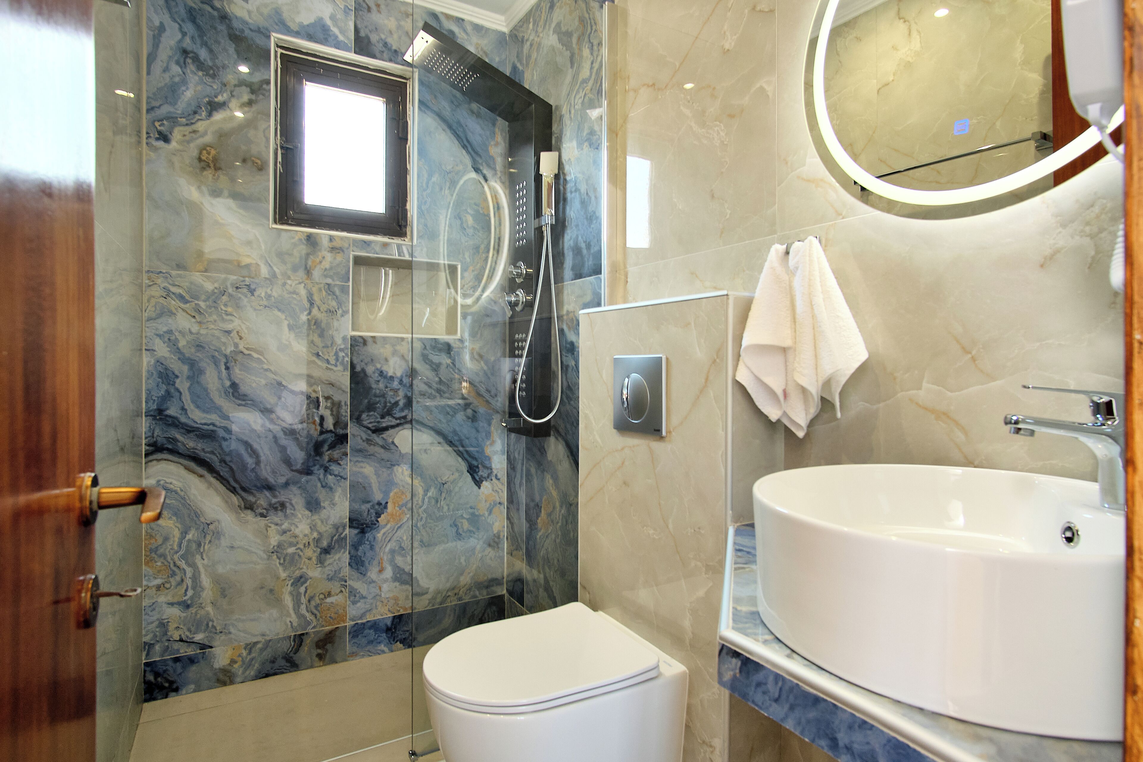 Shower, free toiletries, hair dryer, towels