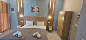 Luxury Apartment, Lanai, Courtyard View | Blackout drapes, soundproofing, iron/ironing board, free WiFi