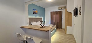 Luxury Apartment, Balcony, Sea View | Living area | 32-inch flat-screen TV with digital channels, TV