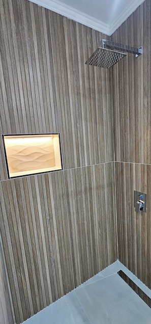 Luxury Apartment, Lanai, Courtyard View | Bathroom | Shower, free toiletries, hair dryer, towels