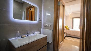 Hair dryer, bidet, towels, soap