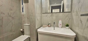 Hair dryer, towels, soap, toilet paper