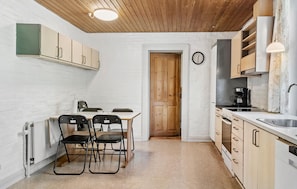 Fridge, stovetop, dishwasher, coffee/tea maker