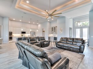 TV, fireplace, books - Villa Coral Paradise w/ a dock! (Cape Coral)