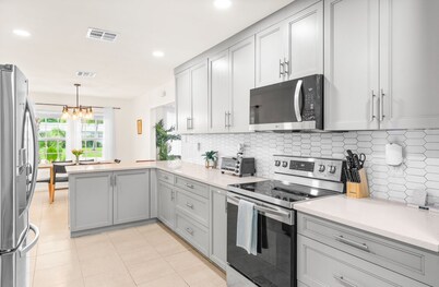 Modern renovated beach oasis home with private pool