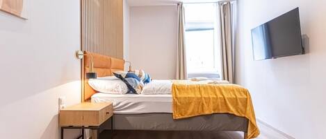 1 slaapkamer, een strijkplank/strijkijzer, wifi, beddengoed