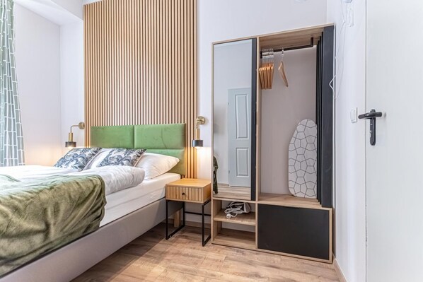 1 slaapkamer, een strijkplank/strijkijzer, wifi, beddengoed