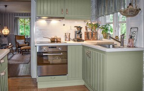 Fridge, stovetop, coffee/tea maker