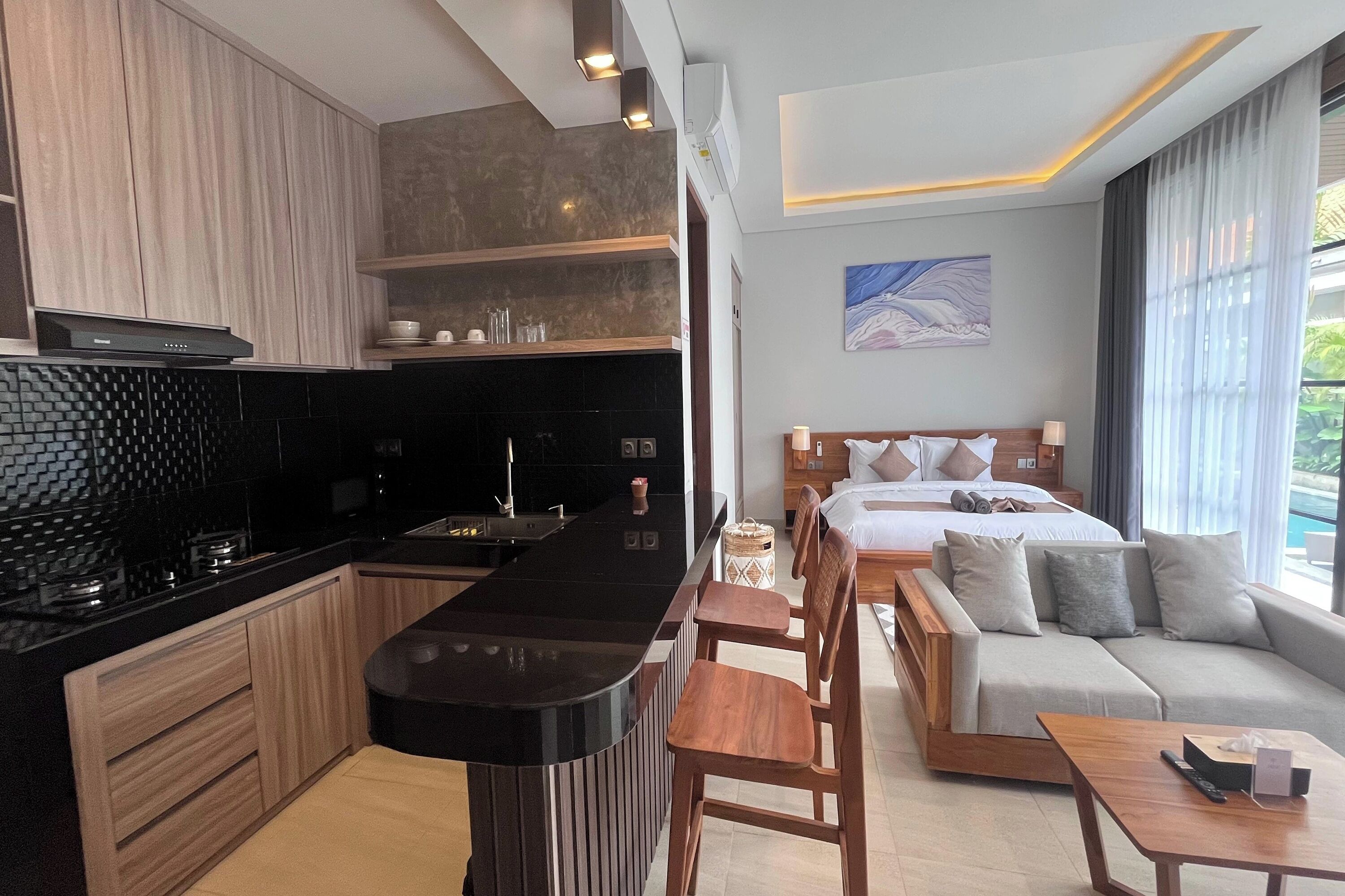 Suite Pool Access | Living area | 24-inch flat-screen TV with cable channels