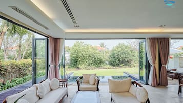 Deluxe-villa - udsigt til have | Opholdsområde | Printere