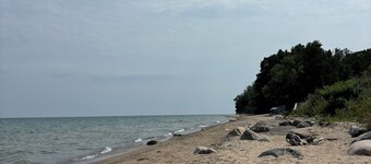 Nestled close to a sandy, secluded beach, this is a cozy retreat.