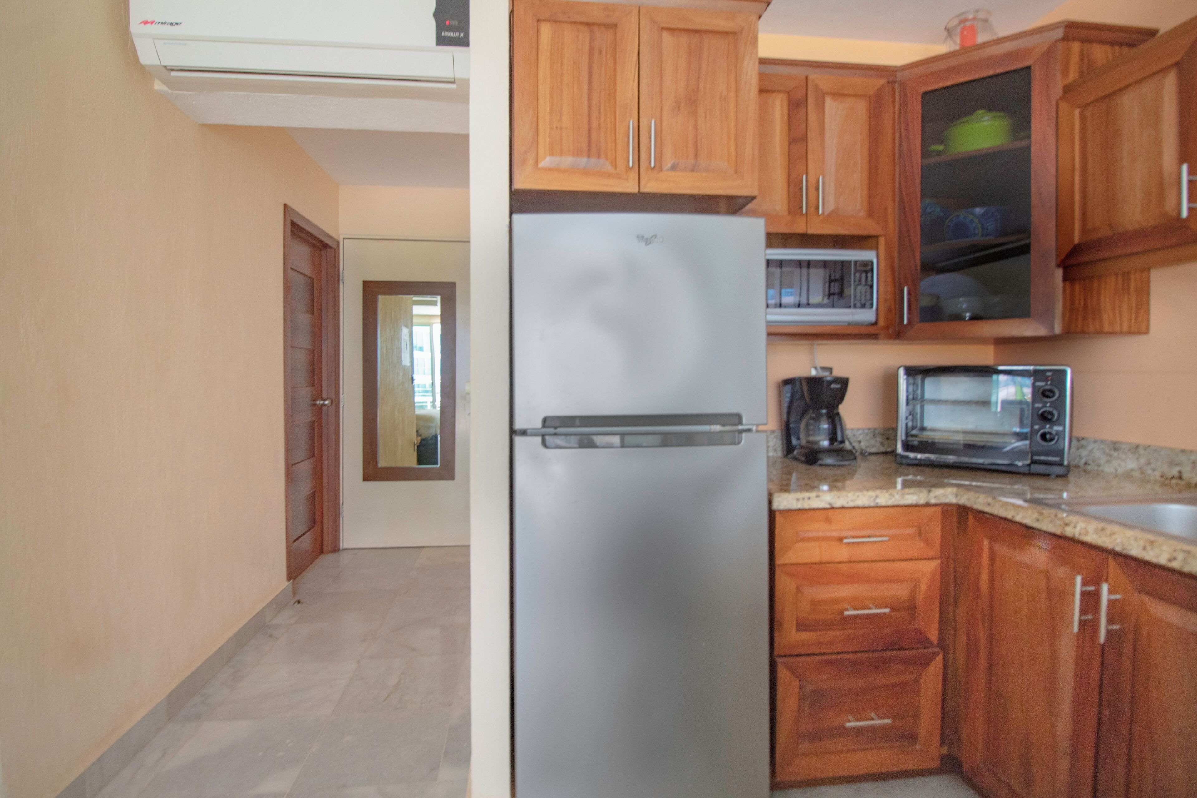 Fridge, microwave, stovetop, coffee/tea maker