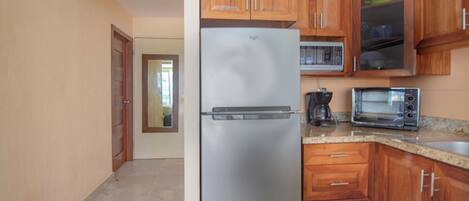 Fridge, microwave, stovetop, coffee/tea maker