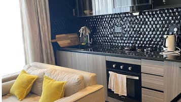 Deluxe-Studio, Stadtblick | Wohnbereich