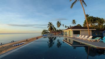 Outdoor pool, pool umbrellas, sun loungers