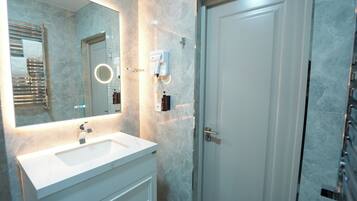 Shower, free toiletries, hair dryer, slippers