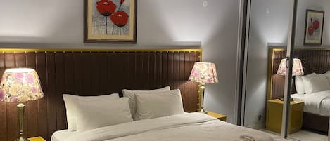 Penthouse, City View | 3 bedrooms, in-room safe, blackout drapes, iron/ironing board