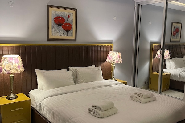 Penthouse, City View | 3 bedrooms, in-room safe, blackout curtains, iron/ironing board