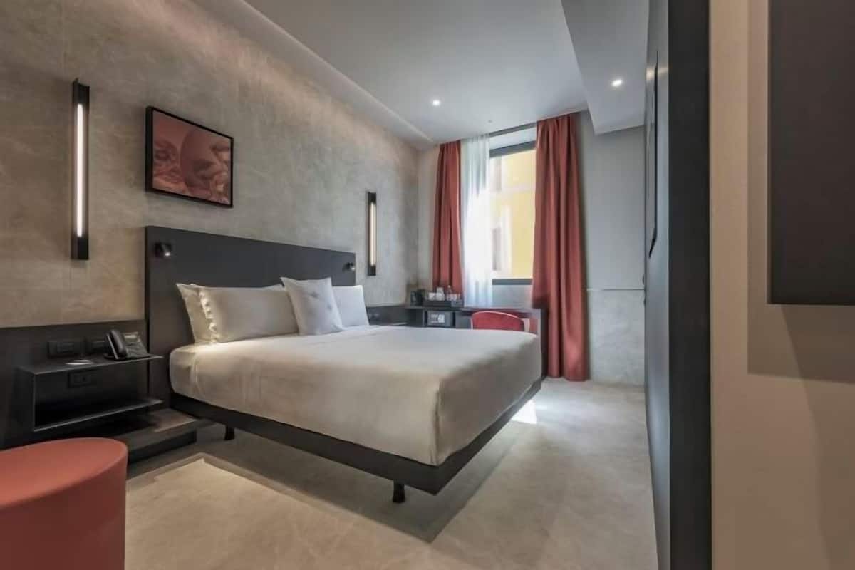 Down duvets, minibar, in-room safe, desk