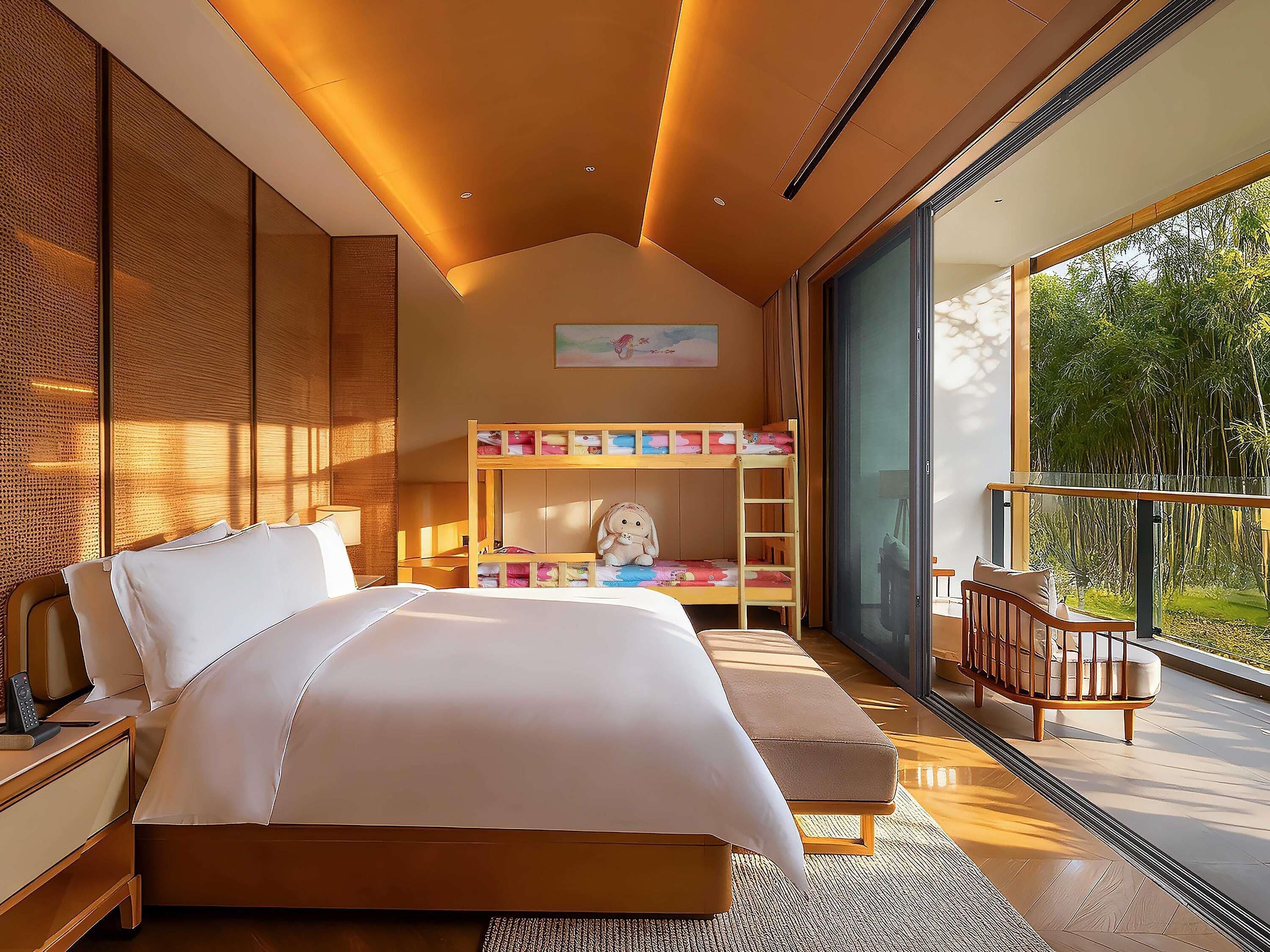A modern bedroom with a large bed, a bunk bed, a balcony with a view of greenery, and a large window.