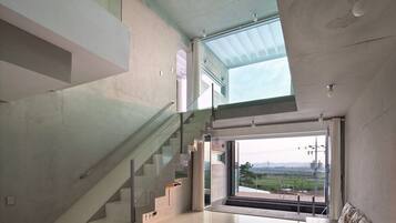 Luxury Room | Living area | LED TV, heated floors