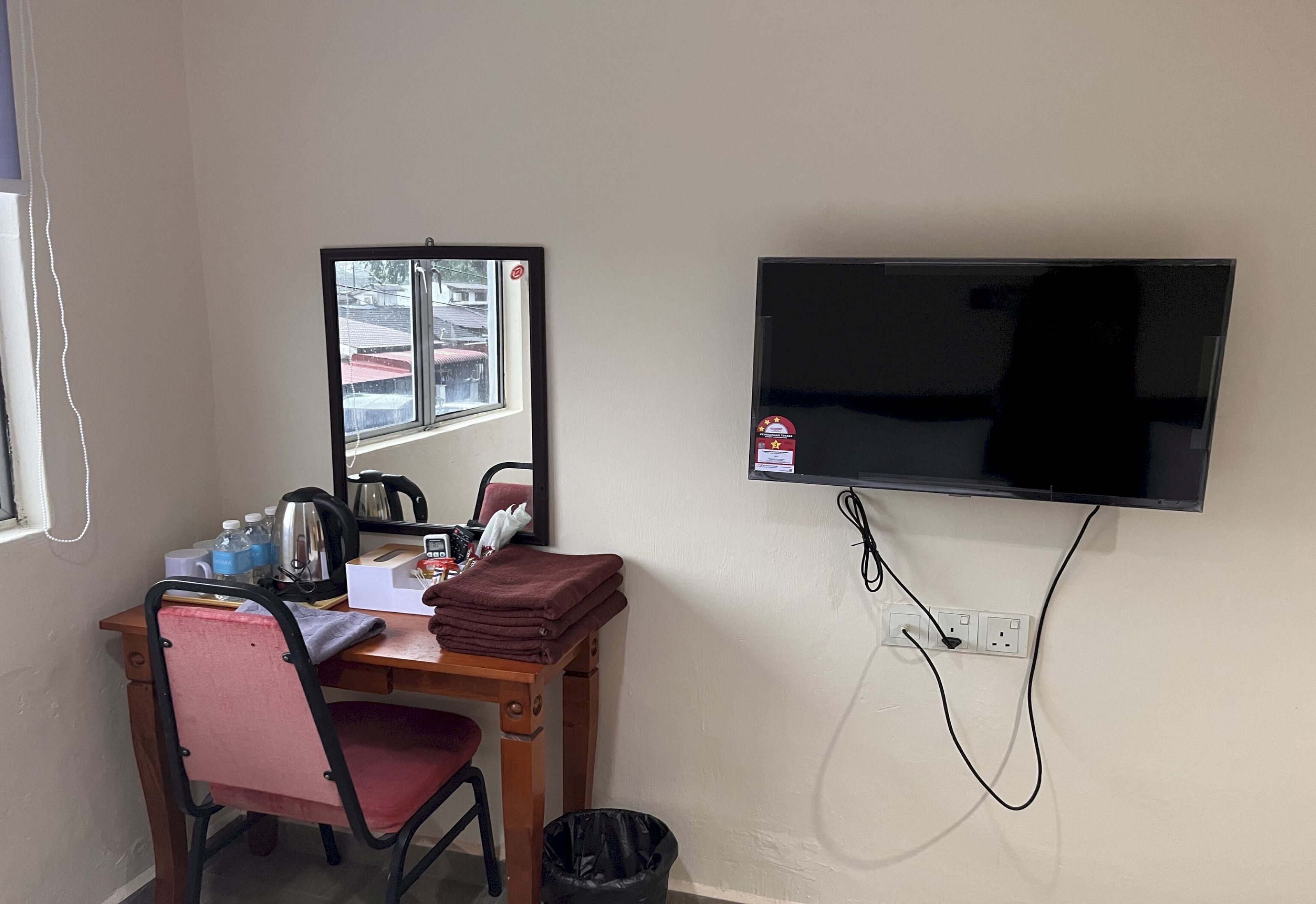 Desk, laptop workspace, bed sheets