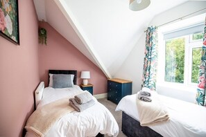 2 dormitorios, tabla de planchar con plancha, cuna de viaje y wifi