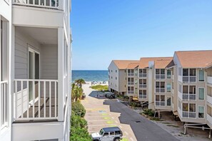 Enjoy ocean views from the balcony of this beachfront residence.