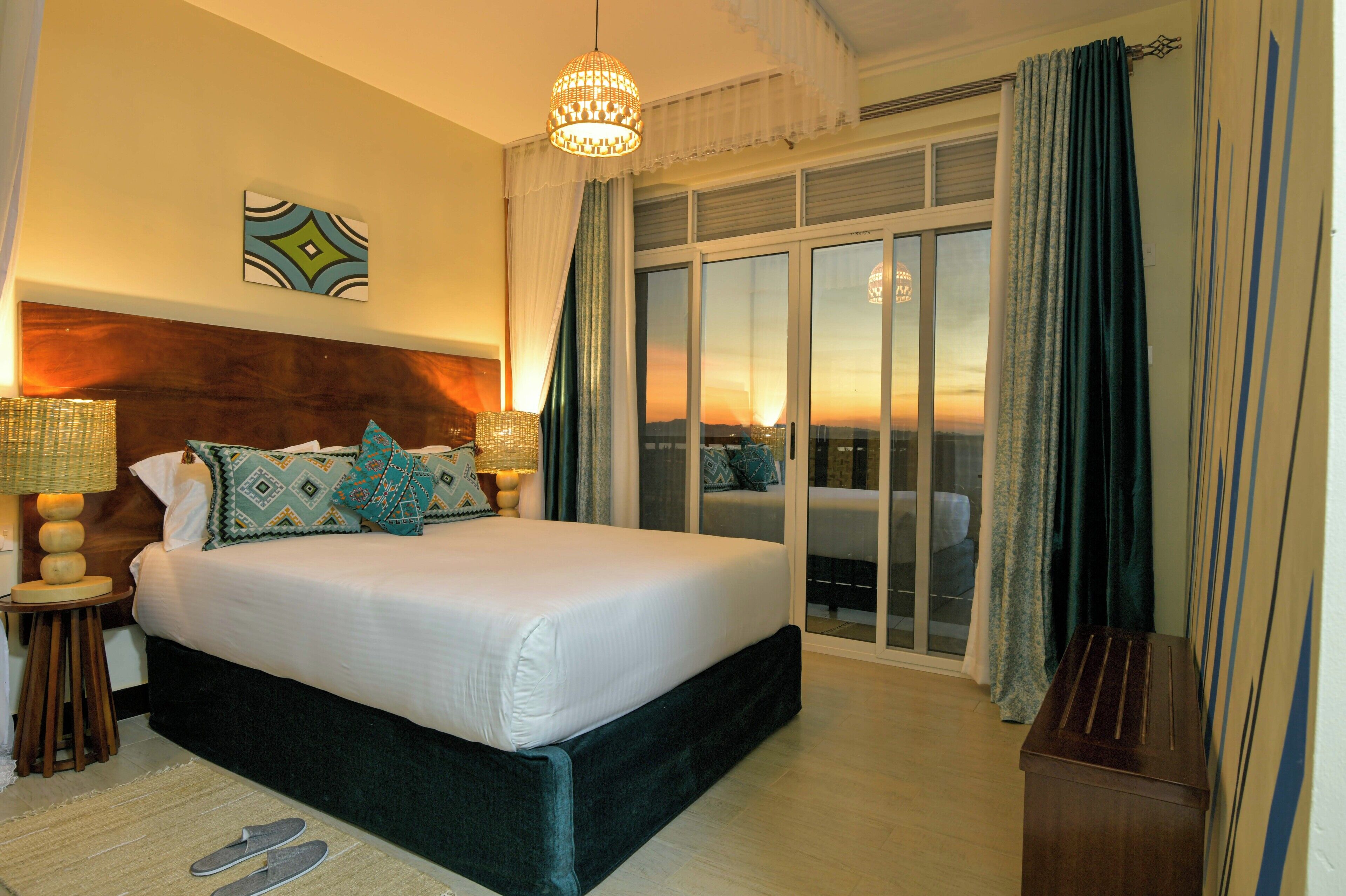 Premium bedding, memory-foam beds, laptop workspace, soundproofing