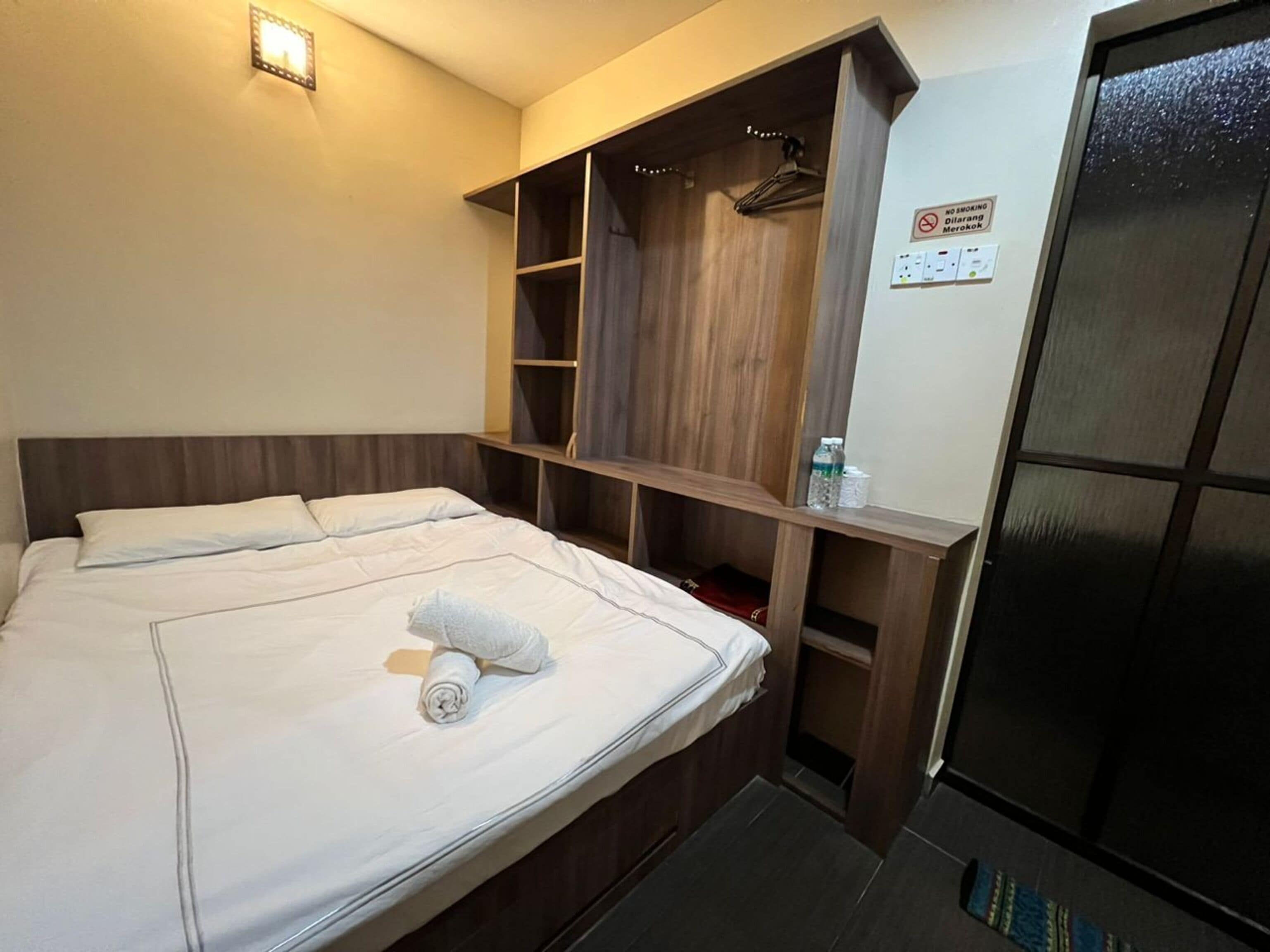 Desk, laptop workspace, bed sheets