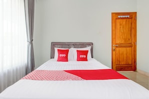 Chambre Double Deluxe | Draps fournis