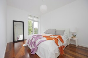 Apartment, 1 Bedroom, 2 Bathrooms | 1 bedroom, desk, laptop workspace, bed sheets - Cozy Apartment With Parking by Renters (Warsaw)