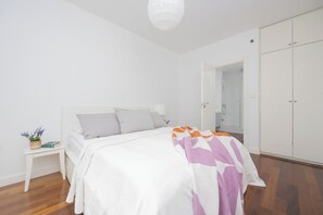 Apartment, 1 Bedroom, 2 Bathrooms | 1 bedroom, desk, laptop workspace, bed sheets - Cozy Apartment With Parking by Renters (Warsaw)
