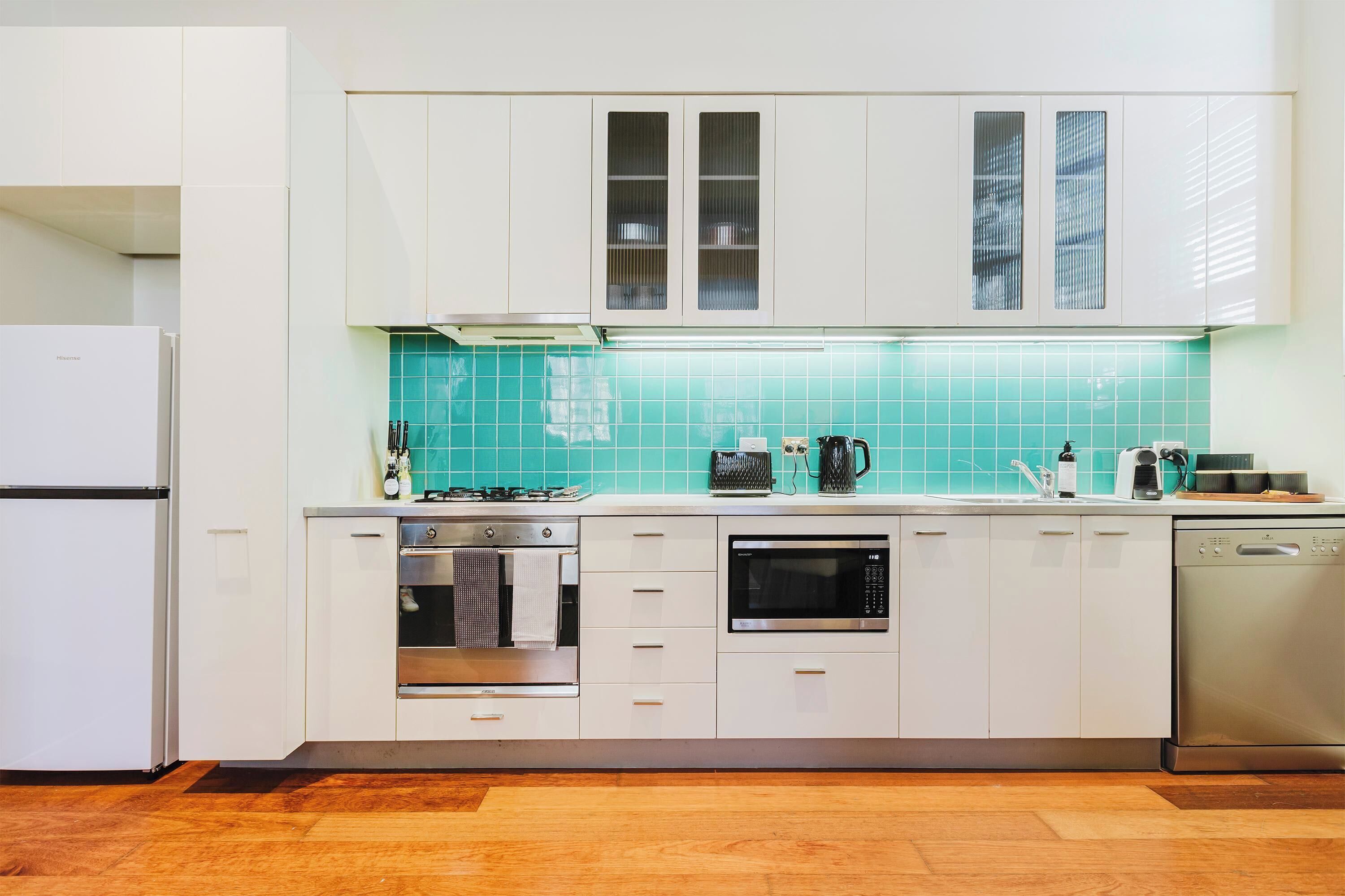 Coffee/tea maker, fridge, microwave, oven