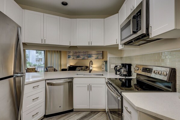 Fridge, microwave, dishwasher, coffee/tea maker