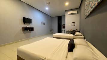 1 bedroom, desk, laptop workspace, bed sheets
