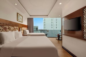 Family Quadruple Room, City View | Premium bedding, desk, laptop workspace, blackout drapes