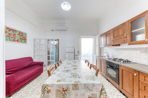 Enjoy meals in this well-equipped kitchen with an oven and gas stove, perfect for cooking up a feast.