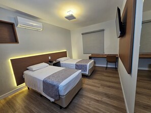 Luxury Twin Room, City View | Desk, laptop workspace, free WiFi