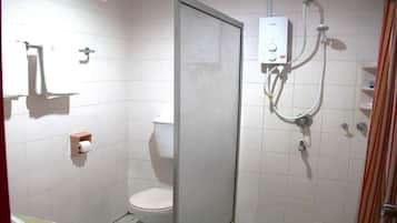 A bathroom with a toilet, a shower enclosure, and a towel rack.